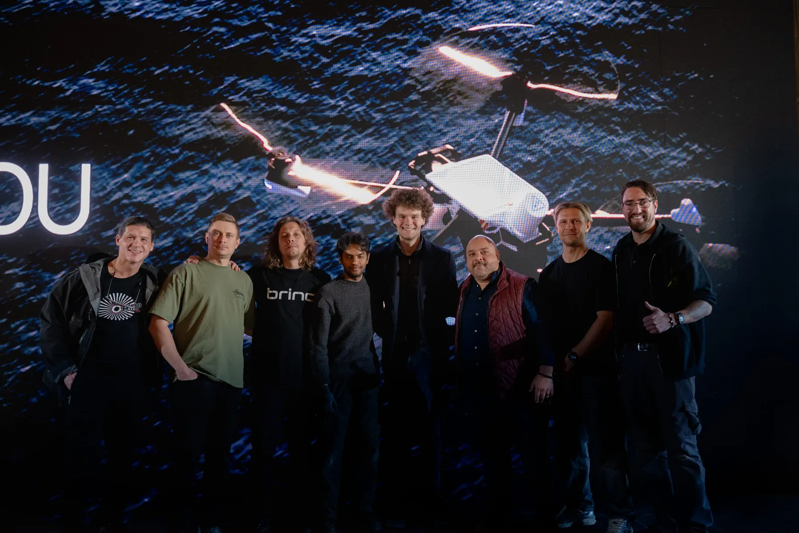 The production crew with the BRINC team in front of the LED wall